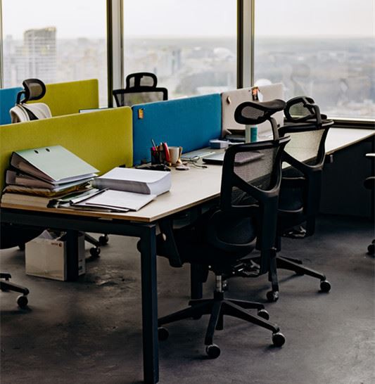 Canva - Black Rolling Chair Near White Table_